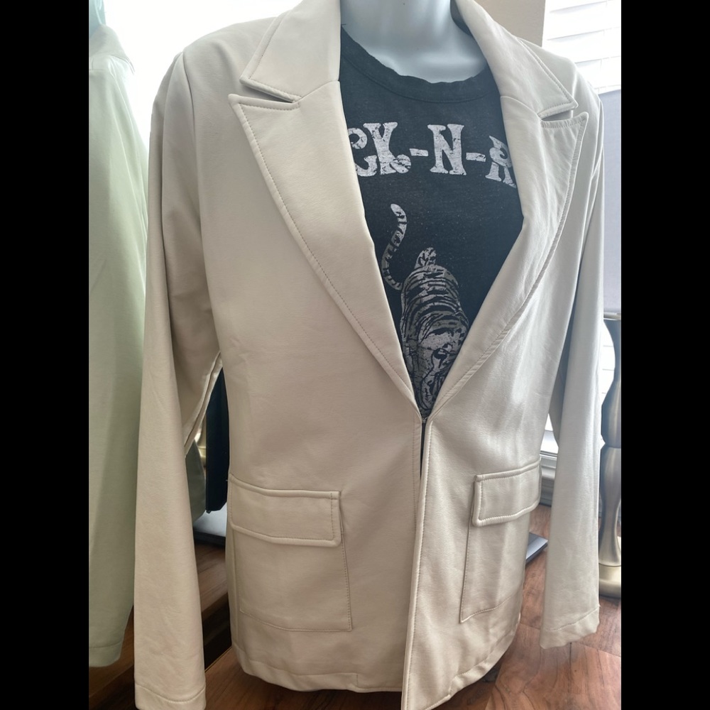 Brand new faux leather jacket. Supple